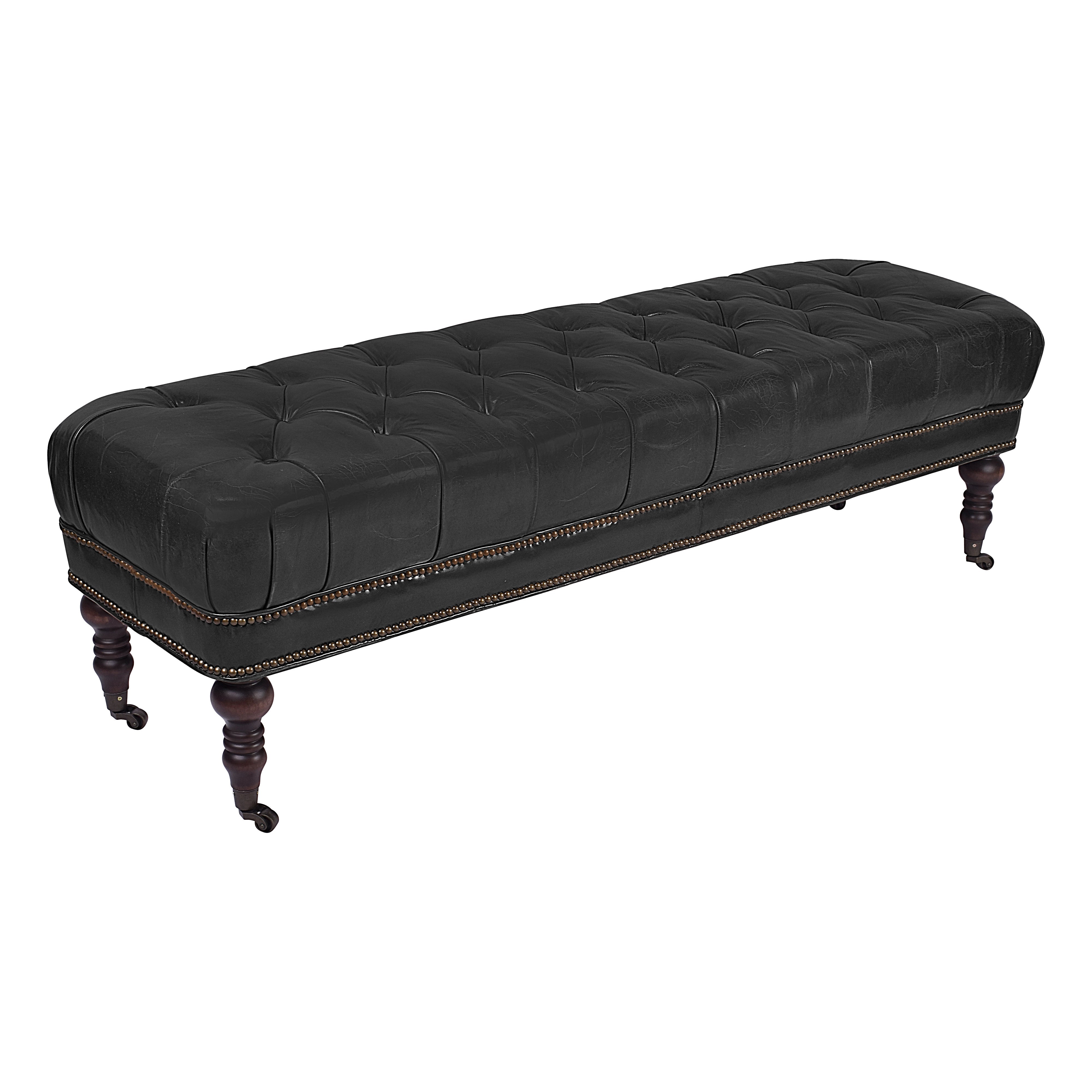 Black tufted store bench